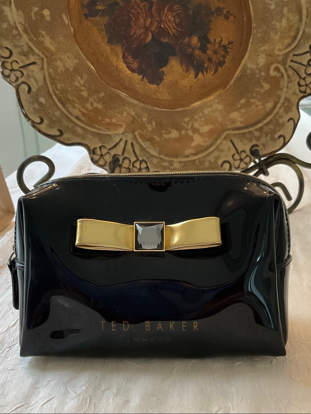 Ted Baker Black Patent Cosmetic Pouch with Gold Bow Accent